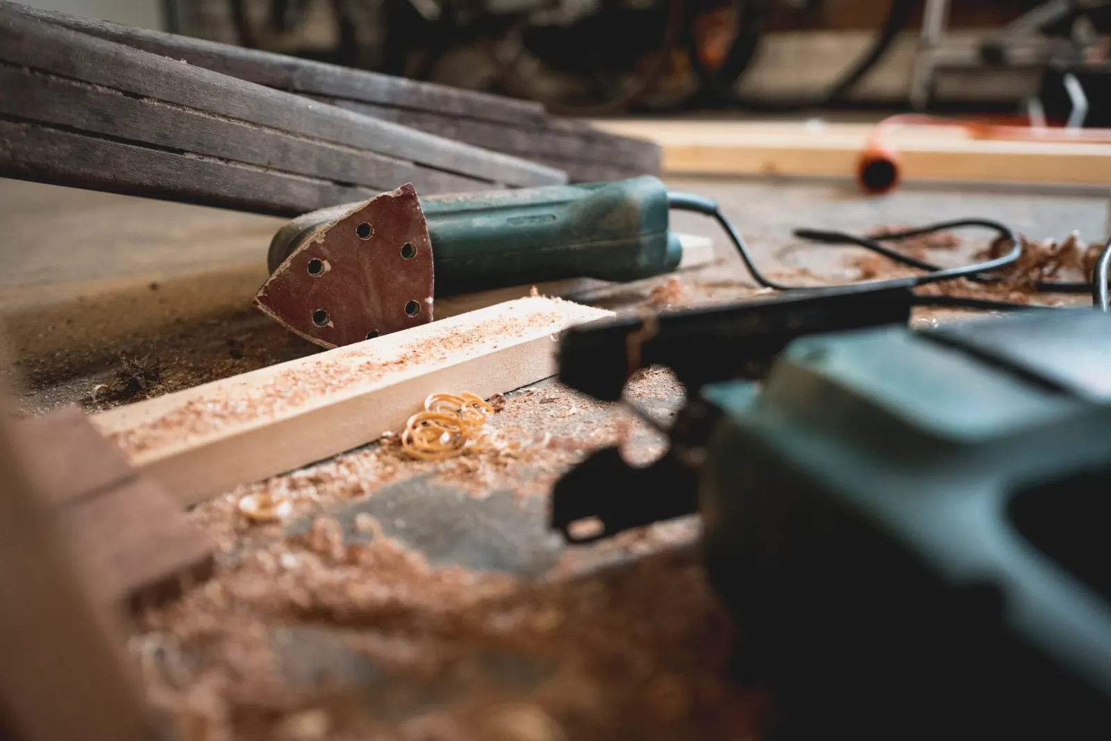 A joinery bench with clamps and hand tools laid out along it